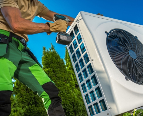 Hvac Technician Installing Large Modern Heat Pump 2023 11 27 05 04 45 Utc Scaled